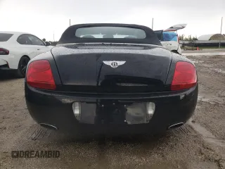 2008 Bentley Continental GT z VIN SCBDR33W18C054610, wystawiony jako Copart lot #61075993 z przebiegiem 72 911 mil mil oraz . Historia ofert i sprzedaży dostępna na DreamBid. Obrazek 6.