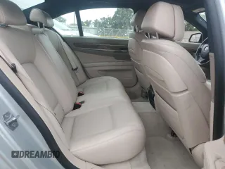 2013 BMW 7 Series 740i with VIN WBAYA6C53DD143952, listed as a Copart auction lot 76064454 with 119,896 mi miles and Clean Title. Bid and sale history available at carsss.com. Image 10.