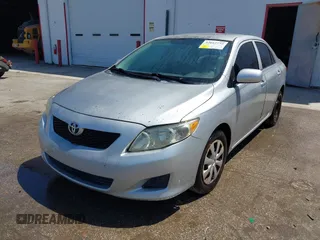 2010 Toyota Corolla with VIN 1NXBU4EE3AZ250198, listed as a IAAI auction lot 42012752 with 175,636 mi miles and . Bid and sale history available at DreamBid. Image 2.