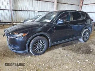2017 Mazda CX-5 Sport with VIN JM3KFABL9H0210264, listed as a Copart auction lot 87918795 with 129,827 mi miles and Salvage Title. Bid and sale history available at carsss.com. Image 1.