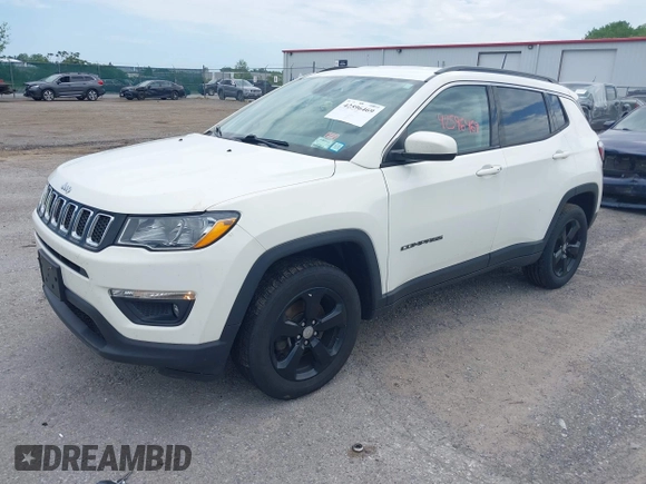 2019 Jeep Compass Latitude with VIN 3C4NJDBB8KT684116, listed as a IAAI auction lot 42596469 with 73,219 mi miles and . Bid and sale history available at DreamBid. Image 2.