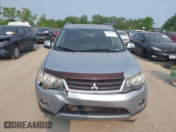 2009 Mitsubishi Outlander SE with VIN JA4LT31W09Z014816, listed as a IAAI auction lot 42399219 with 188,136 mi miles and . Bid and sale history available at DreamBid. Image 12.