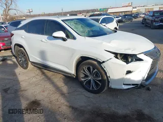 2016 Lexus RX 350 z VIN 2T2ZZMCA5GC033385, wystawiony jako IAAI lot #41442065 z przebiegiem 103 007 mil mil oraz . Historia ofert i sprzedaży dostępna na DreamBid. Obrazek 1.