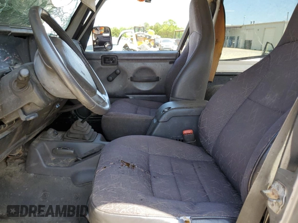 2002 Jeep Wrangler Sport with VIN 1J4FA49S42P720277, listed as a Copart auction lot 55856135 with Not provided miles and Salvage title. Bid and sale history available at DreamBid. Image 7.