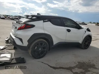 2022 Toyota C-HR XLE z VIN JTNKHMBXXN1131677, wystawiony jako Copart lot #57052965 z przebiegiem 77 600 mil mil oraz Szkody całkowita. Historia ofert i sprzedaży dostępna na DreamBid. Obrazek 3.