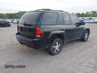 2009 Chevrolet TrailBlazer LT w/2LT with VIN 1GNDT33S192110085, listed as a IAAI auction lot 42084586 with 252,158 mi miles. Bid and sale history available at carsss.com. Image 4.