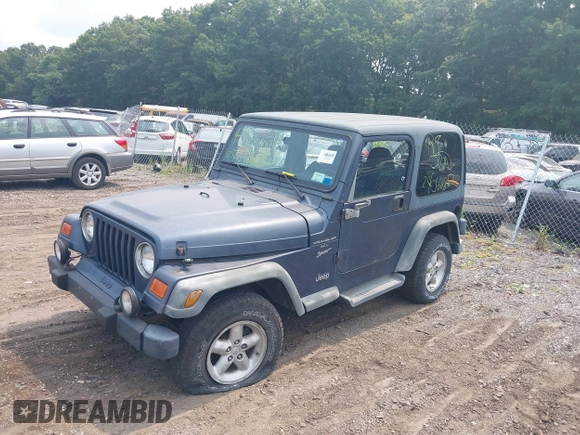 2001 Jeep Wrangler Sport with VIN 1J4FA49S91P330175, listed as a IAAI auction lot 40133432 with 999,999 mi miles. Bid and sale history available at carsss.com. Image 2.