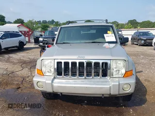 2007 Jeep Commander Sport z VIN 1J8HG48K87C696538, wystawiony jako IAAI lot #39853716 z przebiegiem 226 491 mil mil oraz . Historia ofert i sprzedaży dostępna na DreamBid. Obrazek 12.