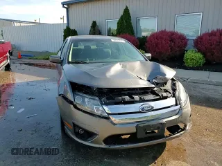 2012 Ford Fusion SE z VIN 3FAHP0HA0CR437115, wystawiony jako Copart lot #56583495 z przebiegiem 159 649 mil mil oraz Szkoda całkowita • Salvage title. Historia ofert i sprzedaży dostępna na DreamBid. Obrazek 13.