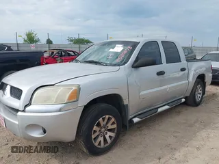 2007 Mitsubishi Raider LS z VIN 1Z7HC28K07S126180, wystawiony jako IAAI lot #42206291 z przebiegiem 227 143 mil mil oraz . Historia ofert i sprzedaży dostępna na DreamBid. Obrazek 2.