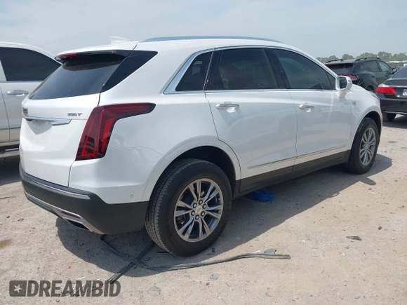2021 Cadillac XT5 FWD Premium Luxury z VIN 1GYKNCR42MZ174309, wystawiony jako IAAI lot #42051341 z przebiegiem 75 544 mil mil oraz . Historia ofert i sprzedaży dostępna na DreamBid. Obrazek 4.