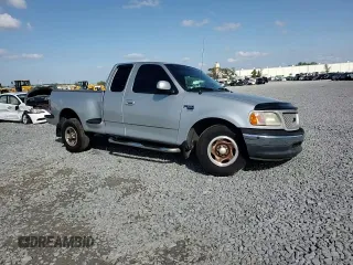 1999 Ford F-150 z VIN 1FTRX07WXXKB92796, wystawiony jako Copart lot #48352405 z przebiegiem Nie podano mil oraz Szkoda całkowita • Salvage title. Historia ofert i sprzedaży dostępna na DreamBid. Obrazek 11.