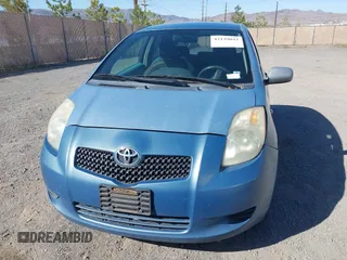 2007 Toyota Yaris with VIN JTDJT923475072209, listed as a IAAI auction lot 42139042 with 335,137 mi miles. Bid and sale history available at carsss.com. Image 6.
