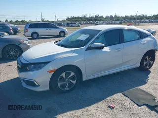 2020 Honda Civic LX z VIN 19XFC2F68LE206395, wystawiony jako IAAI lot #41720356 z przebiegiem 38 037 mil mil oraz . Historia ofert i sprzedaży dostępna na DreamBid. Obrazek 18.