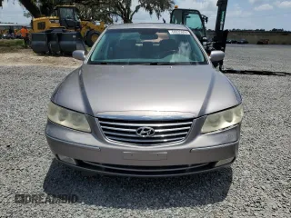 2007 Hyundai Azera SE z VIN KMHFC46FX7A216846, wystawiony jako Copart lot #60035695 z przebiegiem 197 201 mil mil oraz Szkoda całkowita • Salvage title. Historia ofert i sprzedaży dostępna na DreamBid. Obrazek 5.