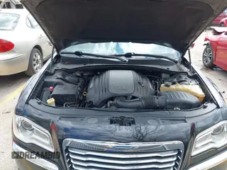 2012 Chrysler 300 with VIN 2C3CCAET1CH284661, listed as a IAAI auction lot 41920717 with 123,505 mi miles. Bid and sale history available at carsss.com. Image 10.