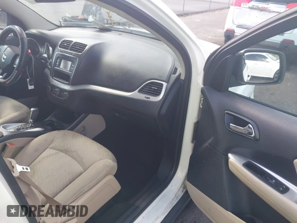 2015 Dodge Journey SXT with VIN 3C4PDCBG0FT653857, listed as a IAAI auction lot 42128410 with 182,960 mi miles and . Bid and sale history available at DreamBid. Image 5.
