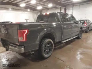 2015 Ford F-150 XLT w/HD Payload Pkg with VIN 1FTFW1EG8FFB59391, listed as a IAAI auction lot 41520010 with 119,414 mi miles. Bid and sale history available at carsss.com. Image 4.