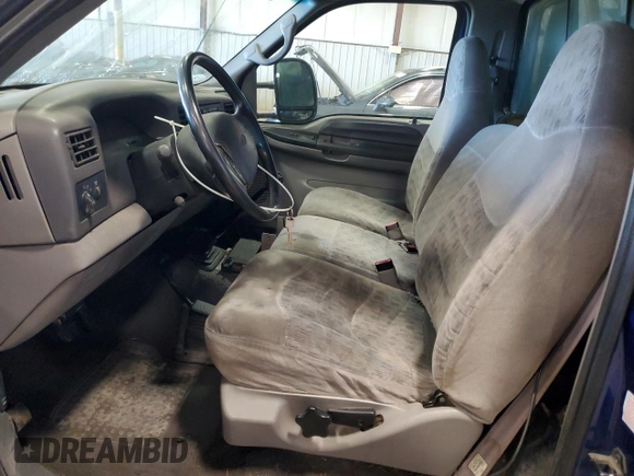 1999 Ford Super Duty F-250 XL with VIN 1FTNF21F2XEB09589, listed as a Copart auction lot 50700795 with 292,135 mi miles and Salvage Title. Bid and sale history available at carsss.com. Image 7.