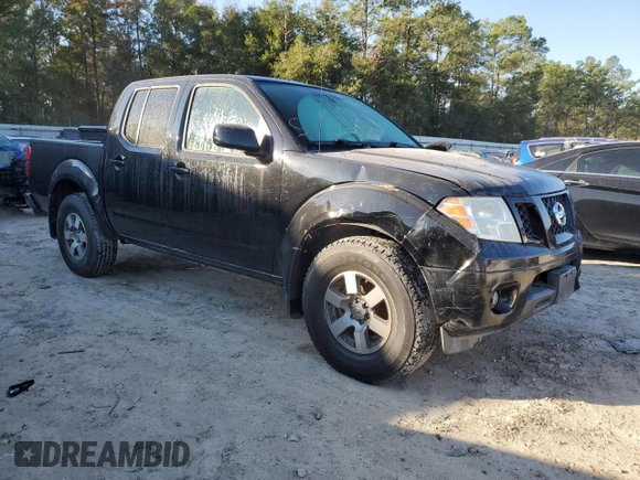 2010 Nissan Frontier LE with VIN 1N6AD0EV1AC407478, listed as a Copart auction lot 82302504 with 146,560 mi miles and Salvage title. Bid and sale history available at DreamBid. Image 4.