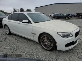 2015 BMW 7 Series 750i z VIN WBAYA8C5XFD825662, wystawiony jako Copart lot #78850474 z przebiegiem 153 080 mil mil oraz Czysty tytuł • Clean title. Historia ofert i sprzedaży dostępna na DreamBid. Obrazek 4.