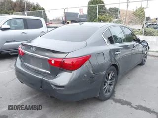 2015 Infiniti Q50 Premium with VIN JN1BV7AP1FM355875, listed as a IAAI auction lot 41777679 with 100,827 mi miles. Bid and sale history available at carsss.com. Image 4.