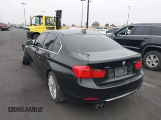 2014 BMW 3 Series 328i xDrive with VIN WBA3B5C51EP543364, listed as a IAAI auction lot 42138365 with 145,243 mi miles and . Bid and sale history available at DreamBid. Image 3.
