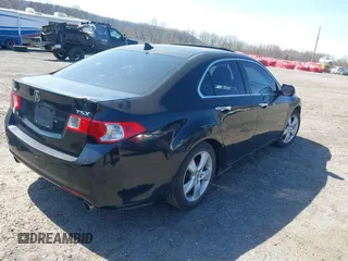 2009 Acura TSX with VIN JH4CU26699C030973, listed as a IAAI auction lot 42039769 with 298,307 mi miles. Bid and sale history available at carsss.com. Image 4.