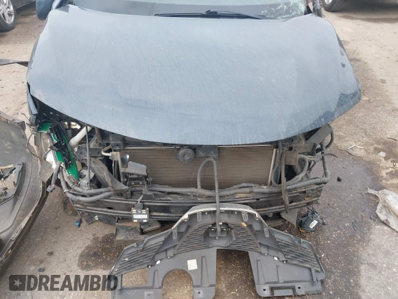 2015 Nissan Rogue SL z VIN 5N1AT2MVXFC853005, wystawiony jako IAAI lot #41480177 z przebiegiem Nie podano mil oraz . Historia ofert i sprzedaży dostępna na DreamBid. Obrazek 13.