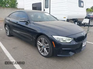 2015 BMW 4 Series 435i xDrive z VIN WBA4B3C54FD669696, wystawiony jako IAAI lot #42598793 z przebiegiem 124 510 mil mil oraz . Historia ofert i sprzedaży dostępna na DreamBid. Obrazek 1.
