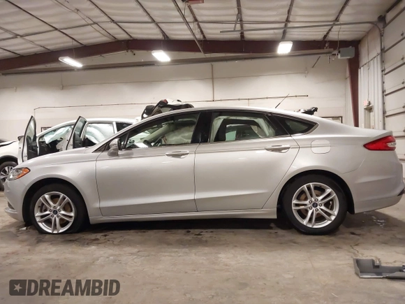 2018 Ford Fusion SE with VIN 3FA6P0HD1JR243112, listed as a IAAI auction lot 42256676 with 112,003 mi miles and . Bid and sale history available at DreamBid. Image 15.