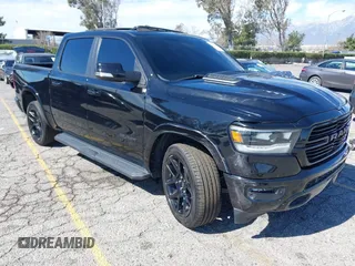 2022 Ram 1500 Laramie with VIN 1C6SRFJTXNN102742, listed as a IAAI auction lot 41619331 with 58,728 mi miles and . Bid and sale history available at DreamBid. Image 1.