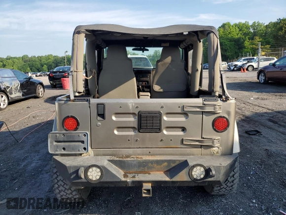 2003 Jeep Wrangler Sahara with VIN 1J4FA59S83P318057, listed as a Copart auction lot 58781495 with 102,571 mi miles and Clean title. Bid and sale history available at DreamBid. Image 6.