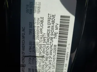 2019 Acura RDX Technology z VIN 5J8TC1H57KL002938, wystawiony jako Copart lot #59406565 z przebiegiem 126 296 mil mil oraz Szkoda całkowita • Salvage title. Historia ofert i sprzedaży dostępna na DreamBid. Obrazek 13.
