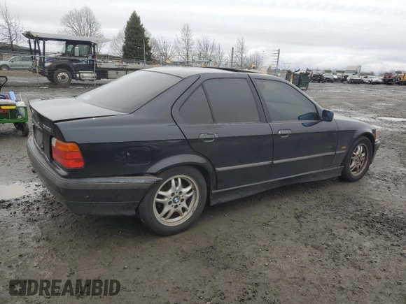 1998 BMW 3 Series 328iA with VIN WBACD4327WAV64492, listed as a Copart auction lot 43583785 with 148,128 mi miles and Salvage Title. Bid and sale history available at carsss.com. Image 3.