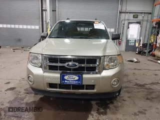 2011 Ford Escape XLT with VIN 1FMCU0D75BKB11168, listed as a IAAI auction lot 41327470 with 136,610 mi miles. Bid and sale history available at carsss.com. Image 13.