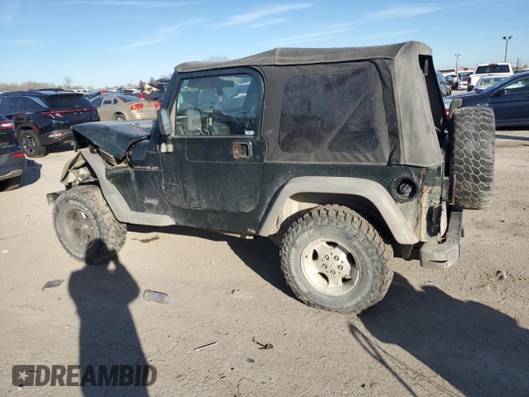 2002 Jeep Wrangler SE with VIN 1J4FA29P72P723223, listed as a Copart auction lot 80833004 with Not Provided miles and Salvage Title. Bid and sale history available at DreamBid. Image 2.