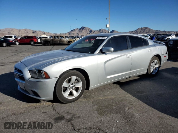 2012 Dodge Charger SE with VIN 2C3CDXBG7CH214766, listed as a Copart auction lot 42142695 with 163,208 mi miles and Salvage Title. Bid and sale history available at DreamBid. Image 1.