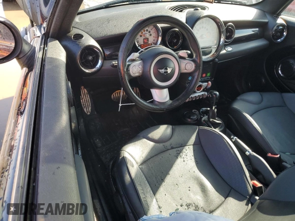 2009 MINI Hardtop S with VIN WMWMF73559TW85198, listed as a Copart auction lot 47538725 with 136,006 mi miles and Salvage title. Bid and sale history available at DreamBid. Image 8.