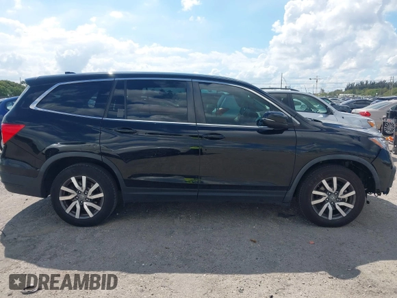 2020 Honda Pilot EX-L with VIN 5FNYF5H59LB014225, listed as a IAAI auction lot 41689776 with 90,994 mi miles. Bid and sale history available at carsss.com. Image 14.