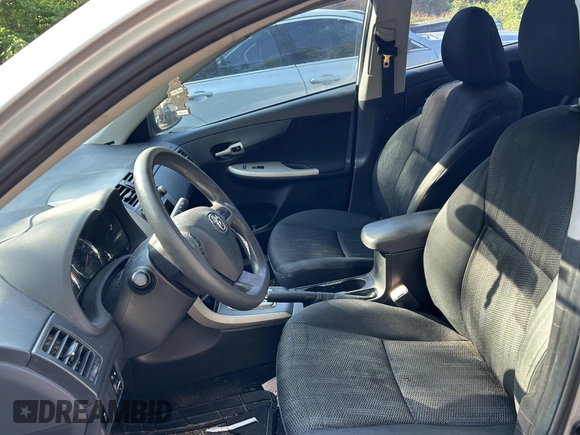 2011 Toyota Corolla L with VIN 2T1BU4EE5BC707015, listed as a IAAI auction lot 42031097 with 182,586 mi miles. Bid and sale history available at carsss.com. Image 5.