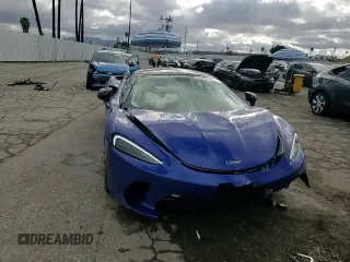 2023 McLaren GT z VIN SBM22GCA9PW003039, wystawiony jako Copart lot #47143765 z przebiegiem 2775 mil mil oraz Szkody całkowita. Historia ofert i sprzedaży dostępna na DreamBid. Obrazek 10.