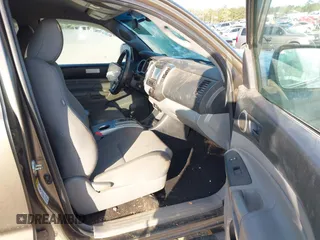2014 Toyota Tacoma with VIN 3TMLU4EN3EM163162, listed as a IAAI auction lot 41930392 with 167,368 mi miles and . Bid and sale history available at DreamBid. Image 5.