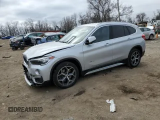 2017 BMW X1 xDrive28i z VIN WBXHT3C36H5F74088, wystawiony jako Copart lot #48990565 z przebiegiem 120 039 mil mil oraz Szkoda całkowita • Salvage title. Historia ofert i sprzedaży dostępna na DreamBid. Obrazek 1.