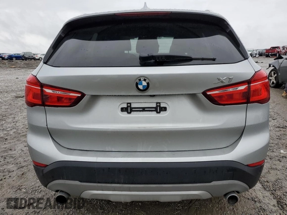 2017 BMW X1 sDrive28i with VIN WBXHU7C33H5H34013, listed as a Copart auction lot 38409444 with 87,558 mi miles and Salvage Title. Bid and sale history available at carsss.com. Image 6.
