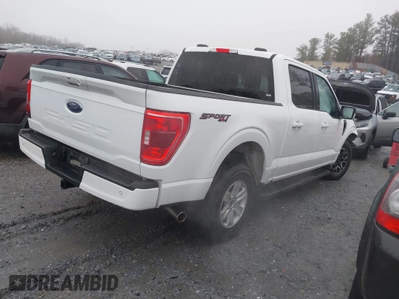 2023 Ford F-150 XL with VIN 1FTFW1E56PFA90555, listed as a IAAI auction lot 41539367 with 53,905 mi miles. Bid and sale history available at carsss.com. Image 4.