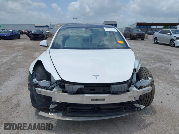 2023 Tesla Model 3 z VIN 5YJ3E1EA8PF384806, wystawiony jako IAAI lot #42526063 z przebiegiem 95 389 mil mil oraz . Historia ofert i sprzedaży dostępna na DreamBid. Obrazek 12.