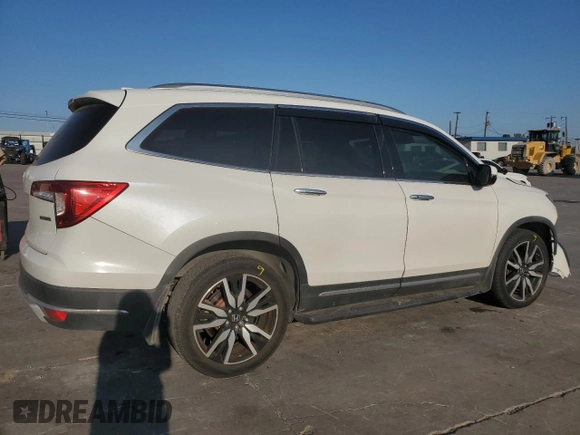 2020 Honda Pilot Touring 8-Passenger with VIN 5FNYF5H97LB009821, listed as a Copart auction lot 70979274 with 70,322 mi miles and Salvage Title. Bid and sale history available at DreamBid. Image 3.