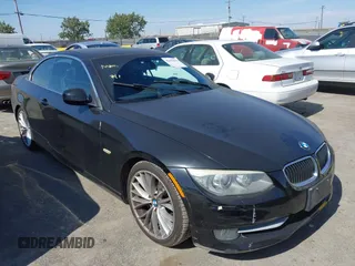 2011 BMW 3 Series 335i with VIN WBADX7C50BE260513, listed as a IAAI auction lot 42653694 with 182,013 mi miles and . Bid and sale history available at DreamBid. Image 1.