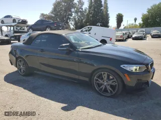 2015 BMW 2 Series M235i with VIN WBA1M1C56FV393730, listed as a Copart auction lot 45348734 with 59,231 mi miles and Salvage Title. Bid and sale history available at carsss.com. Image 4.